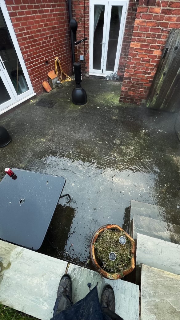 Dirty patio before pressure washing